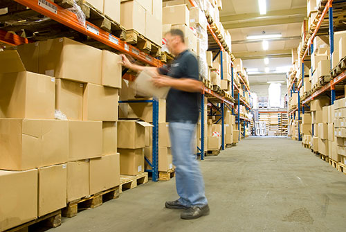 selecting boxes from storage on a pallet rack