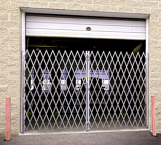 Folding security gate: warehouse dock door application