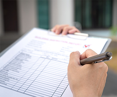 making notes on a checklist