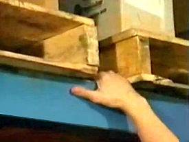 climbing a pallet rack