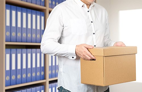 man carrying storage box