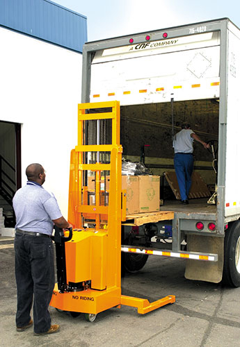 stacker unloading a truck