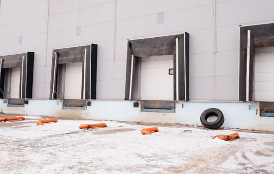 dock doors with snow on the ground outside