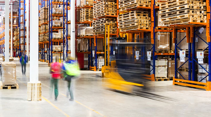 warehouse workers walking