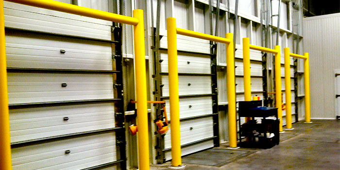 dock door protectors in a warehouse 