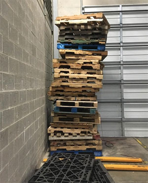 dangerous stack of pallets