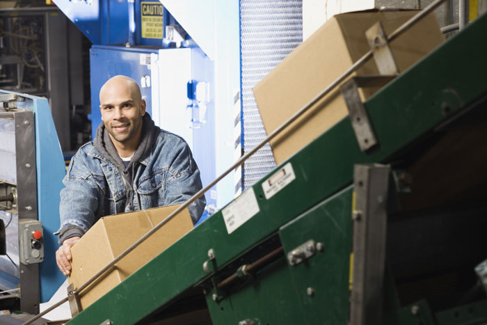 incline conveyor loading in a warehouse