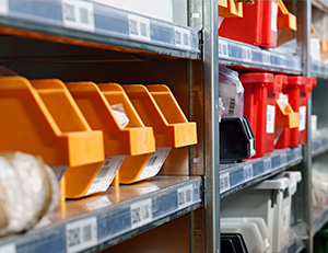 containers and open bins on shelving