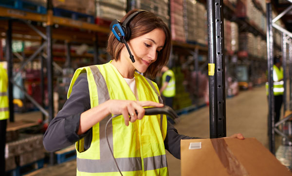 inventory warehouse worker with barcode scanner