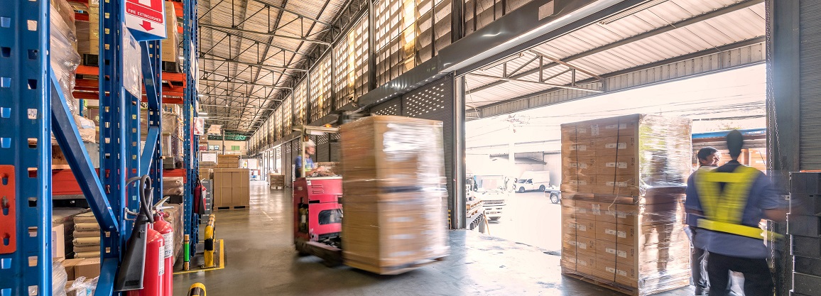 loading dock with forklifts moving