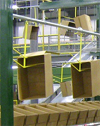 overhead conveyor in a distribution center with empty box loads