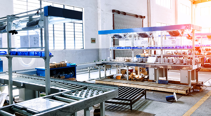 assembly line with integrated conveyors and workstations.