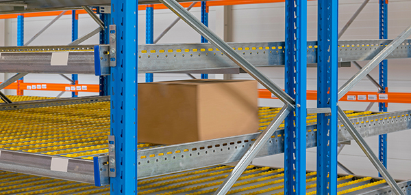 carton flow lanes inserted into pallet rack.