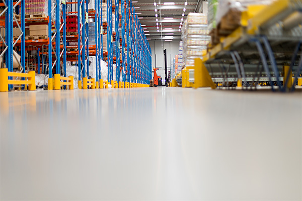 pallet rack and guardrail on a warehouse floor