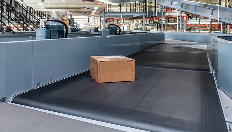 parcel conveyor system in a warehouse fulfillment operation.