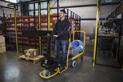 powered cart operating in warehouse environment