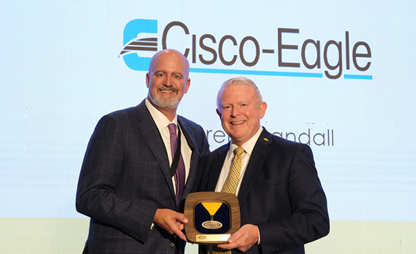Cisco-Eagle President Darein Gandall and Hytrol President David Peacock