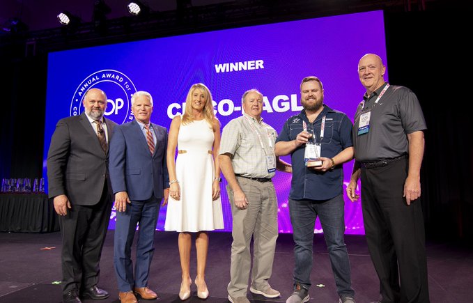 Cisco-Eagle accepting 2022 award for best printed materials small company