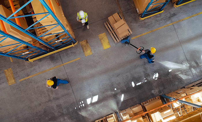 warehouse workers in a distribution facility
