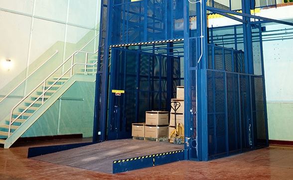 mezzanine lift (VRC) with a ramp installed for forklifts, carts or pallet jack access.