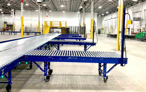 modular power conveyor system at a warehouse dock area