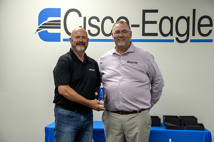 Dale accepts award from Bryan Gauger