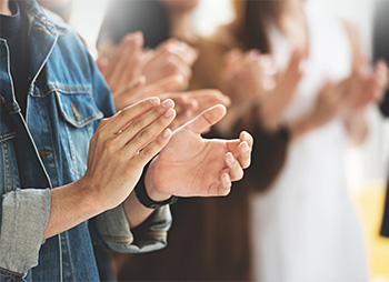 group of people applauding
